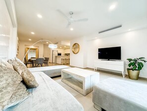 Apartment, Multiple Beds (ATA30 -2 Bed Suite Gym Parking Wifi B) | Living area | TV - Ata30 -2 Bed Suite Gym Parking Wifi Beach Club (Playa del Carmen)