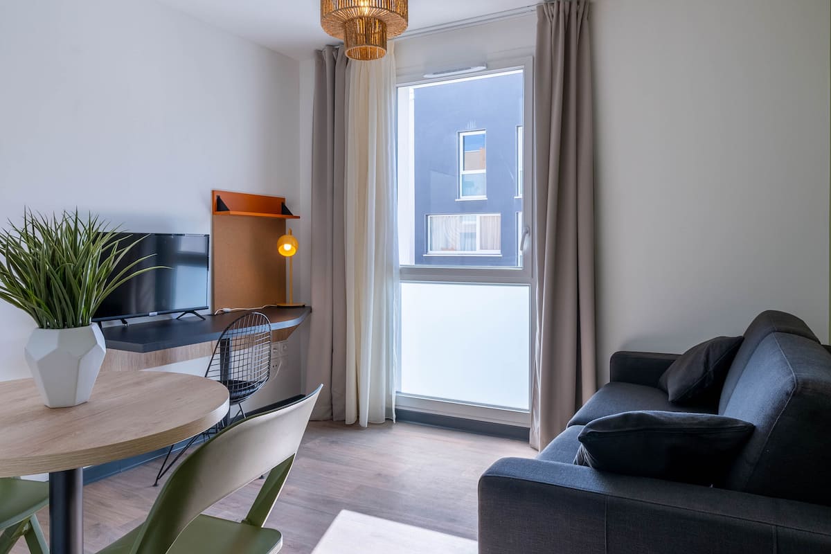 Apartment, 1 Bedroom | Living area | 60-cm TV with digital channels, foosball, table tennis