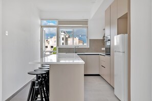 Luxury Apartment | Private kitchen - Phaedrus Living: Romanou Modern City Center Flat (Nicosia)