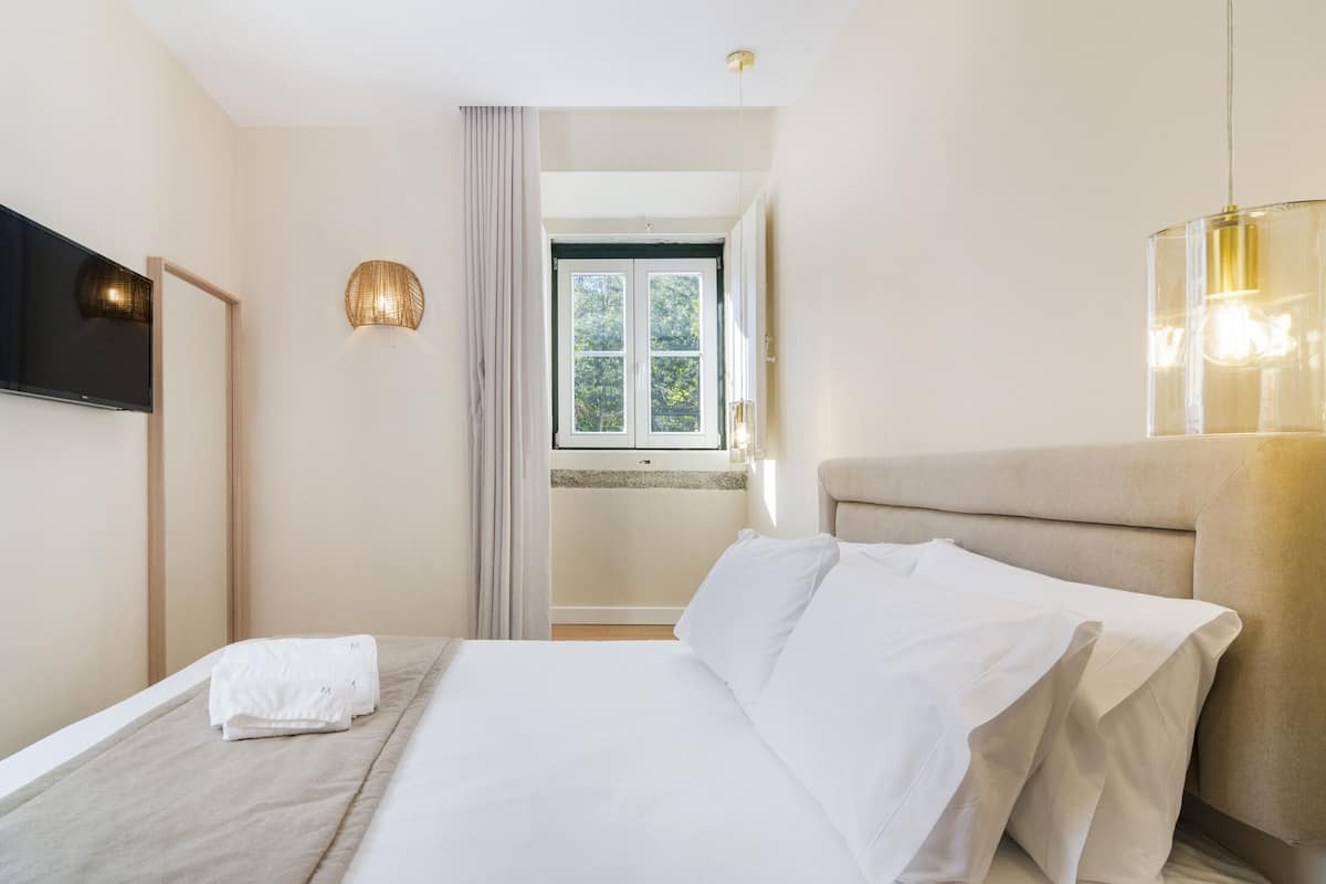 Apartamento ejecutivo | Caja fuerte, sistema de insonorización, wifi gratis y ropa de cama