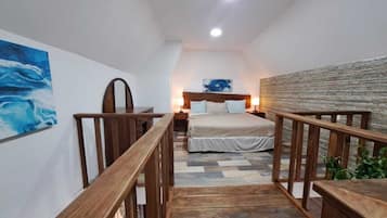 Habitación superior, varias camas, vista al jardín | 1 habitación