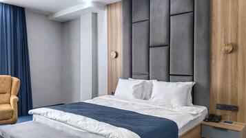 Deluxe Double Room | Minibar, in-room safe, desk, laptop workspace