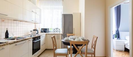 Apartamento | Cozinha privada | Geladeira, fogão, cooktop, torradeira