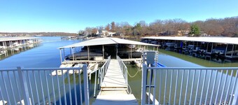 AMAZING LAKE VIEWS!!  Top Floor, remodeled w/ Boat slip, Pool, Laundry