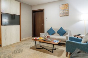 Deluxe suite, 1 slaapkamer | Italiaanse Frette-lakens, luxe beddengoed, pillowtop-bedden