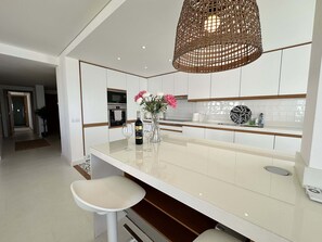 Apartment | Private kitchen | Full-size fridge, microwave, stovetop, dishwasher