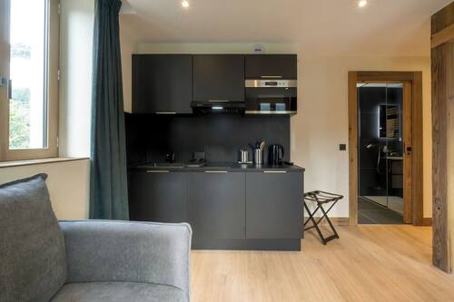 Family Room, Kitchenette | Private kitchenette
