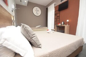 Minibar, in-room safe, individually decorated, desk