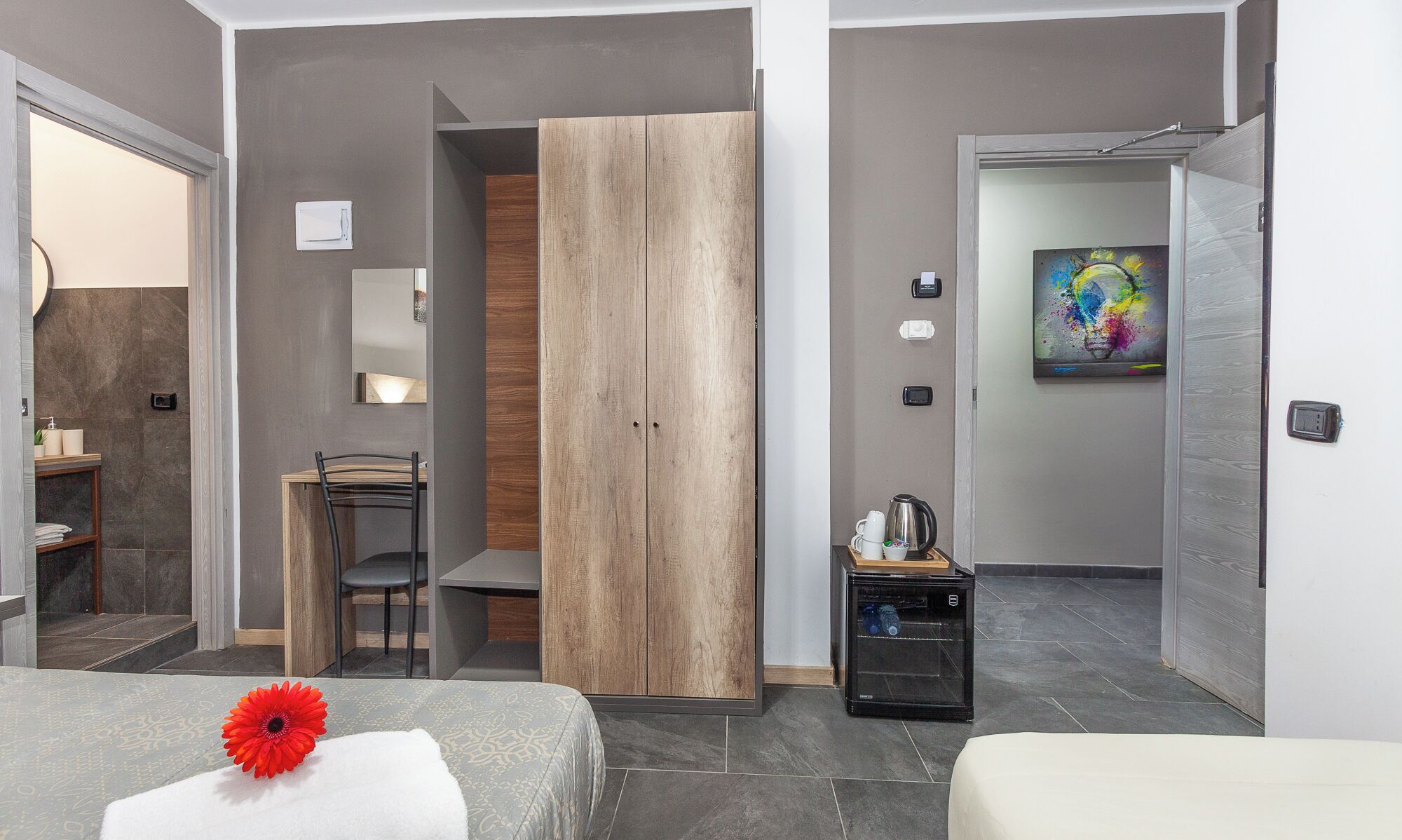 Standard Triple Room | Minibar, in-room safe, individually decorated, desk