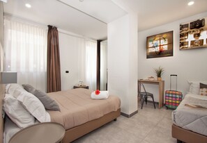 Double Room - Disability Access | Minibar, in-room safe, individually decorated, desk