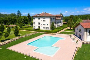 Seasonal outdoor pool, pool umbrellas, pool loungers