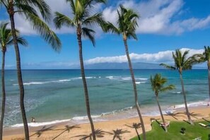 On the beach, sun-loungers, beach towels