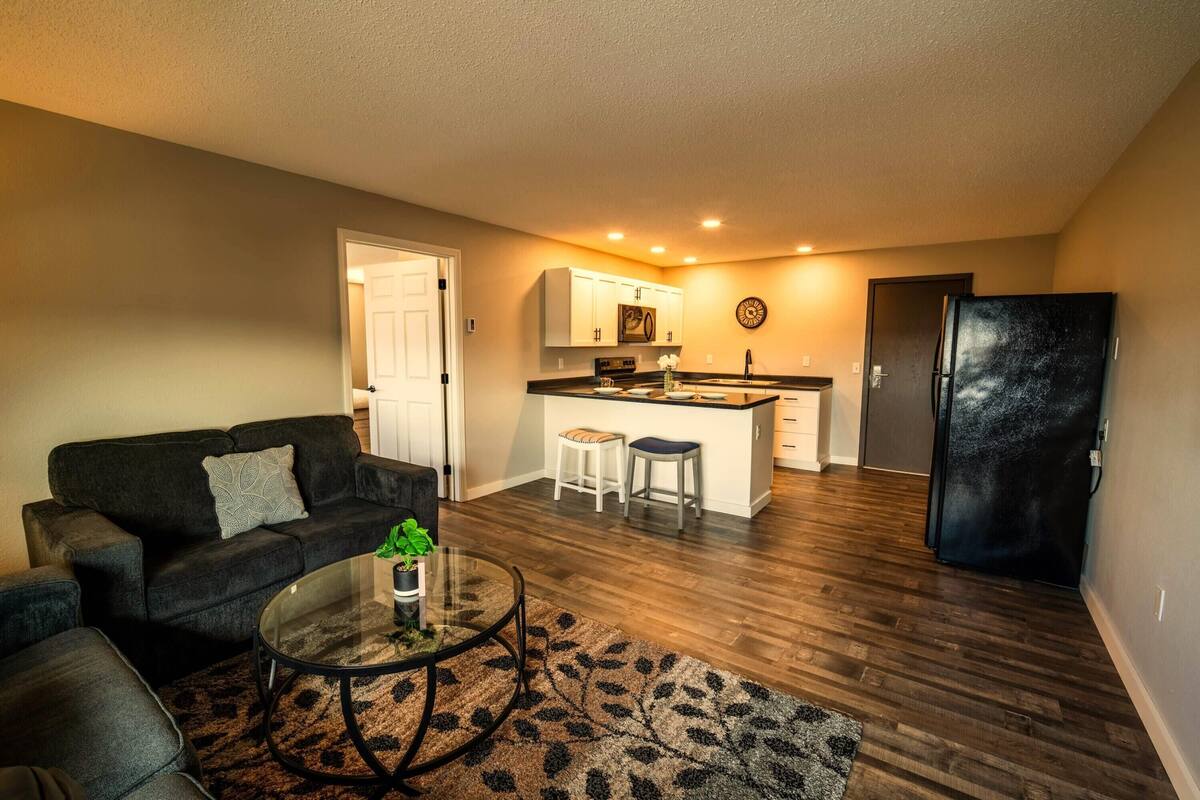 Desk, laptop workspace, blackout curtains, iron/ironing board