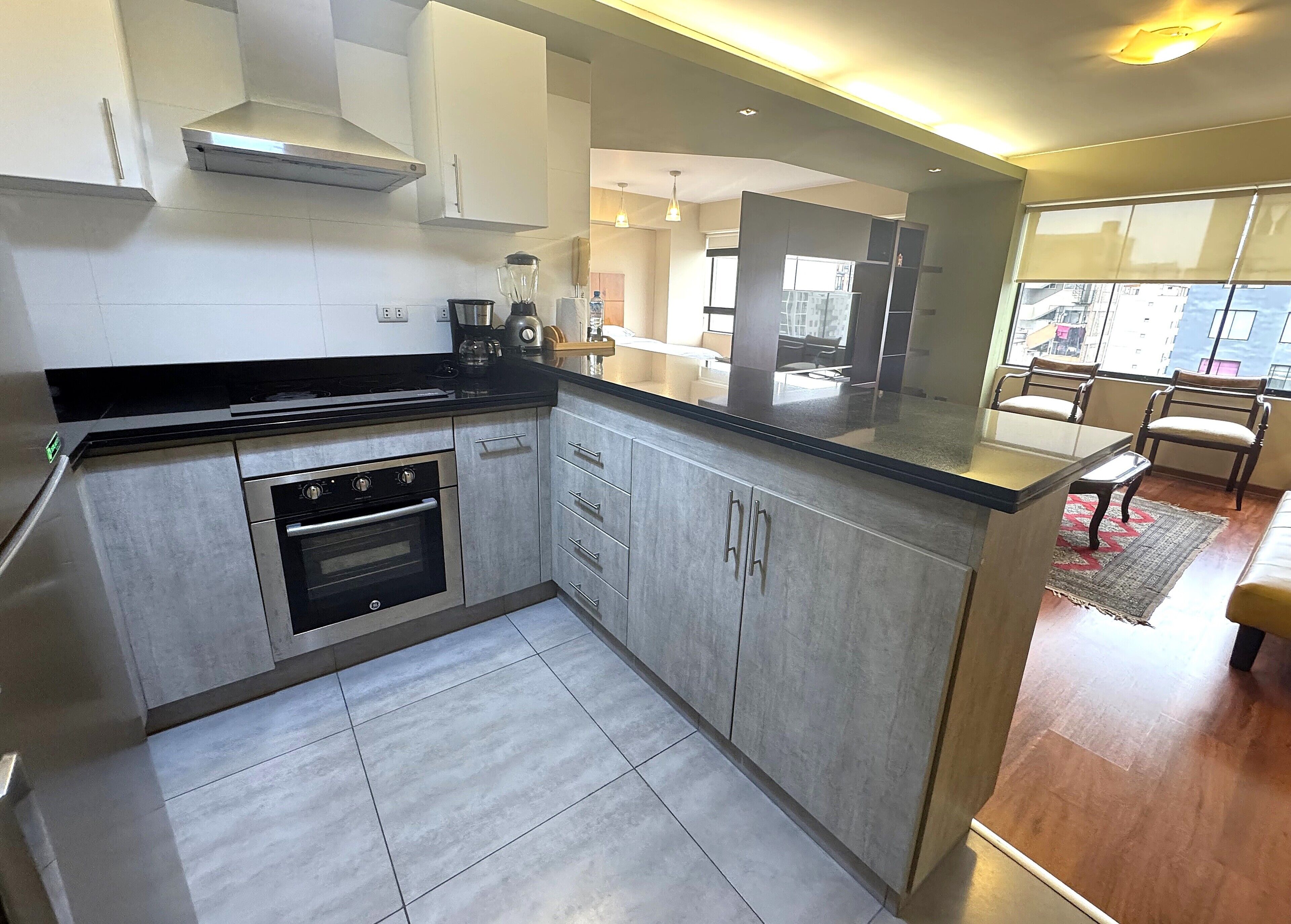 Gác Executive, 1 giường cỡ queen và sofa giường, có phòng tắm riêng, quang cảnh thành phố | Bếp riêng | Tủ lạnh, lò vi sóng, bếp nấu, dụng cụ pha cà phê/trà 