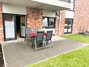 Outdoor dining - StrandStern - Terrace. Sauna. Family time. 300 m to the beach. (Kellenhusen)