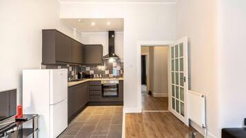 Apartment | Eigene Küche | Kühlschrank, Mikrowelle, Ofen, Herdplatte