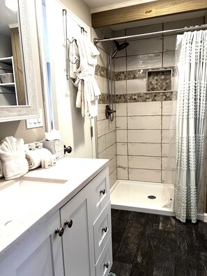 Shower, jetted tub, hair dryer, towels
