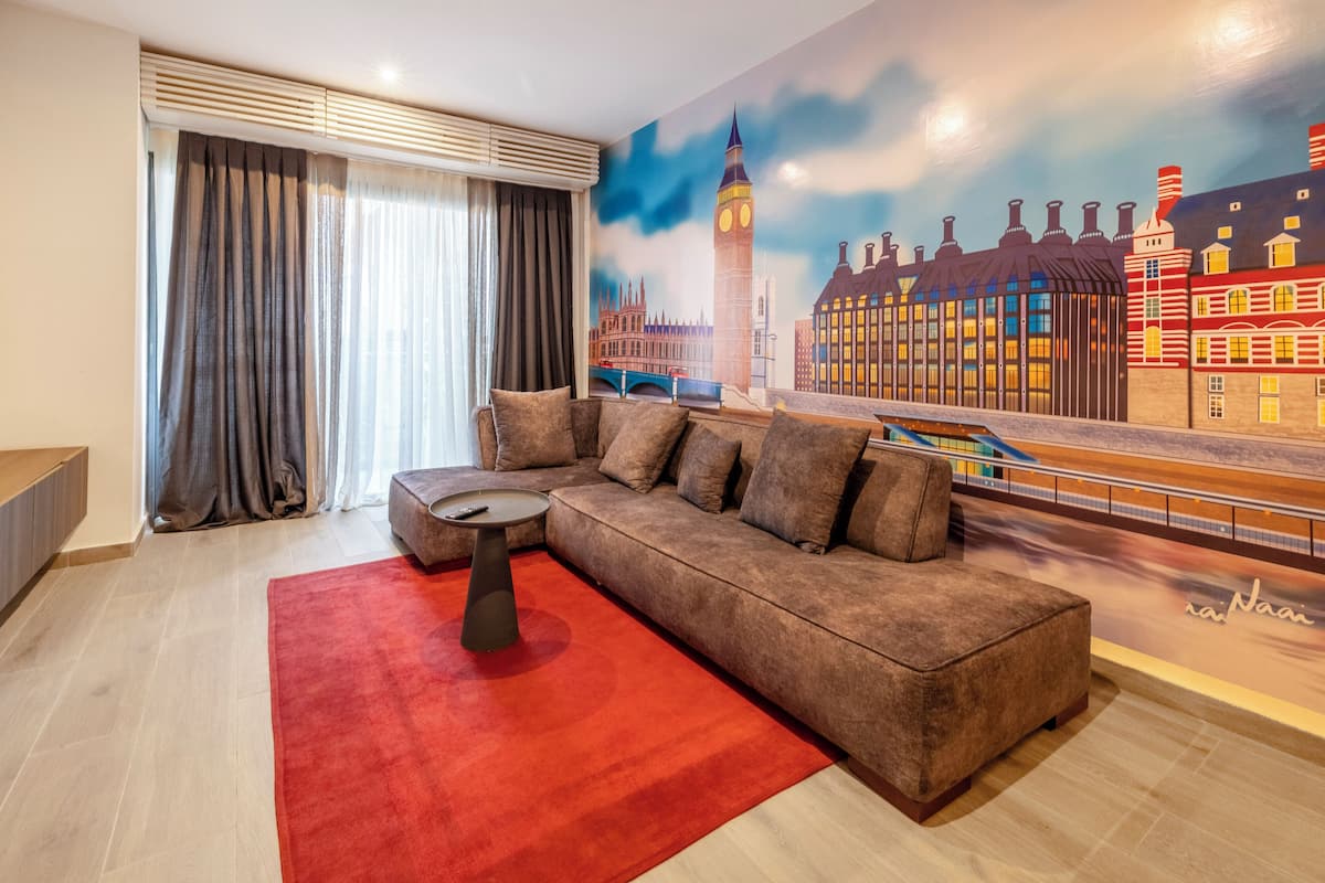 Premium-Apartment, 1 King-Bett, Poolzugang (Appartement London) | Wohnbereich