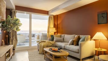 Deluxe Apartment | Living area | Smart TV, Netflix, streaming services