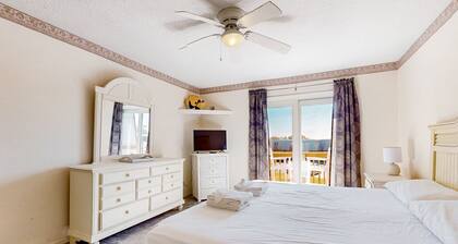 The Villas on Roanoke Sound condo with pier, boat launch, pools, & water views
