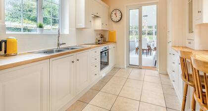 The perfect larger family sized home with vast, lush, enclosed garden.