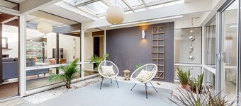 MCM home with atrium & yoga area near Nike HQ, Intel & Washington Square Mall