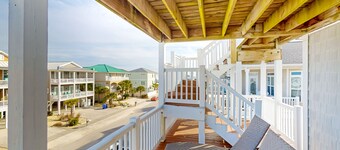 Sprawling coastal estate with two living quarters, pool, beach, & dock access