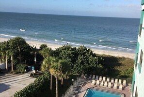 On the beach, sun-loungers - Premier beachfront two bedroom, two bath condo at Cameron Cove. (Indian Rocks Beach)