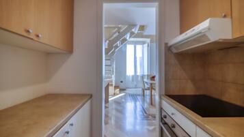 Fridge, oven, coffee/tea maker, cookware/dishes/utensils