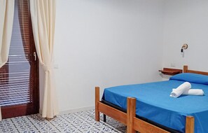 1 dormitori i roba de llit 
