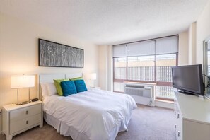 1 bedroom, desk, iron/ironing board, travel cot