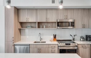Fridge, microwave, oven, stovetop - Luxury One Bedroom Apartment with Balcony | Crystal City Arlington VA |  by GLS (Arlington)