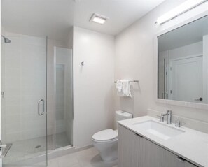 Shower, hair dryer, towels - Luxury One Bedroom Apartment with Balcony | Crystal City Arlington VA |  by GLS (Arlington)