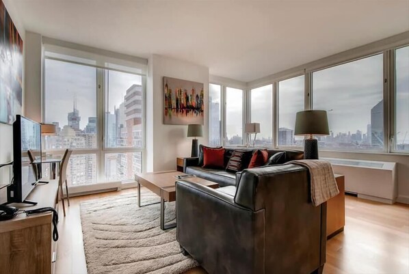 Smart TV - Private Fully Furnished 1BR | Washer & Dryer | Midtown West | by GLS (New York)