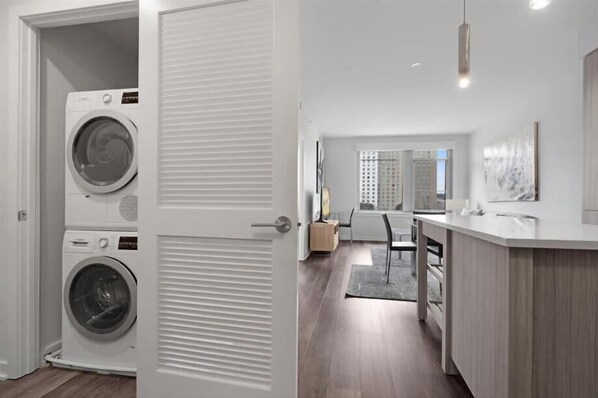 Interior - Modern Midtown South 1BR | Washer/Dryer | Gym+Rooftop | by GLS (New York)