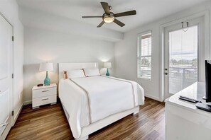 1 bedroom, desk, iron/ironing board, travel crib