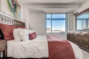 1 bedroom, desk, iron/ironing board, travel crib