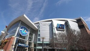 A modern building with a Spectrum Center sign, a box office, and a Crystal sign. - Hot Tub • Fire Pit • Chef’s Kitchen • Near Uptown (Charlotte)