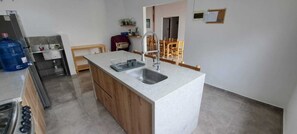 Family House, 4 Bedrooms, Pool Access, Ocean View | Shared kitchen | Cleaning supplies - Las Fragatas de Punta Mero (Canoas de Punta Sal)