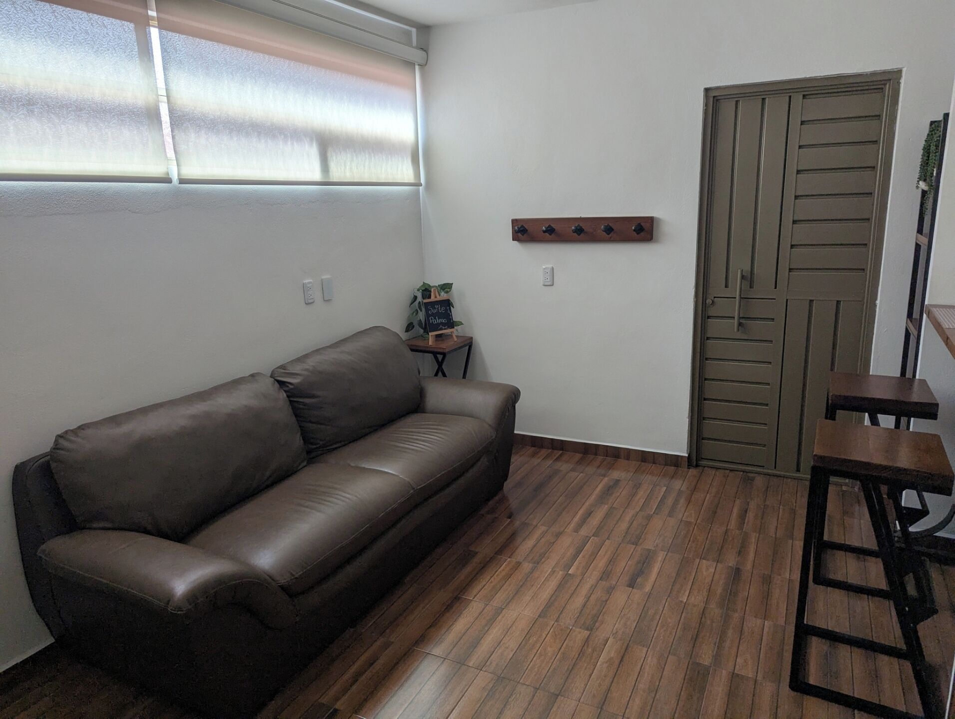 Executive Apartment | Living room | 32-inch Smart TV with digital channels, smart speakers
