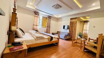 Chambre Double Deluxe | Chambres insonorisées, fer et planche à repasser, Wi-Fi gratuit