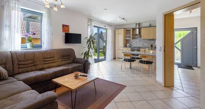 Apartment 'Ferienwohnung Walter' with Private Terrace, Shared Garden and Wi-Fi