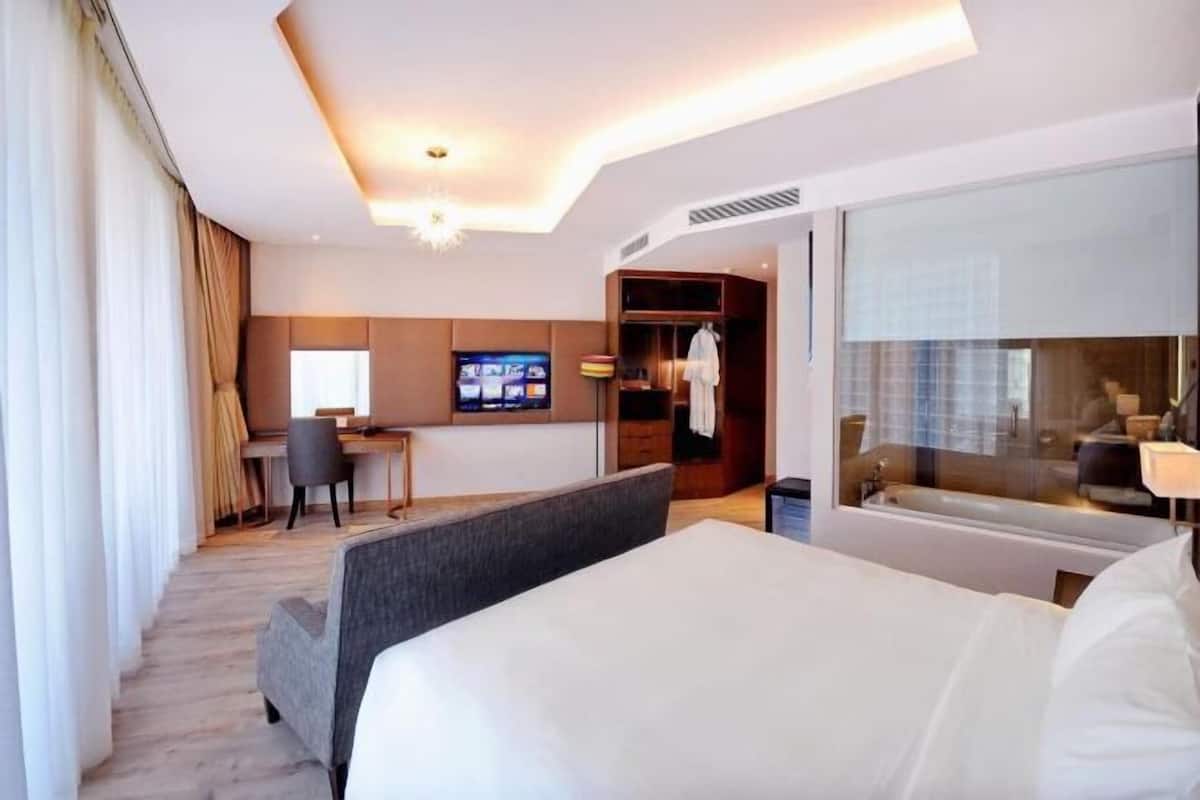 Premium bedding, minibar, desk, laptop workspace