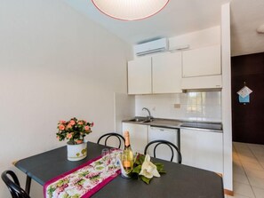 Fridge, microwave, cookware/dishes/utensils