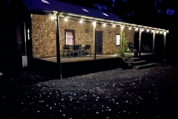 Cottage deck with solar lights.