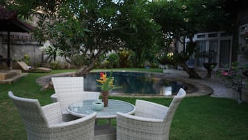 Outdoor pool, pool umbrellas, pool loungers