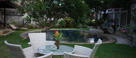 Outdoor pool, pool umbrellas, sun loungers