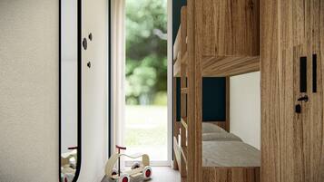 A bedroom with a bunk bed, a wooden wardrobe, a mirror, and a toy car.