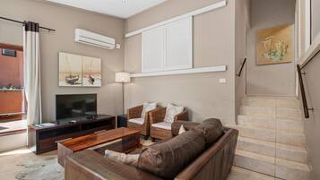Classic Villa | Living area | Flat-screen TV