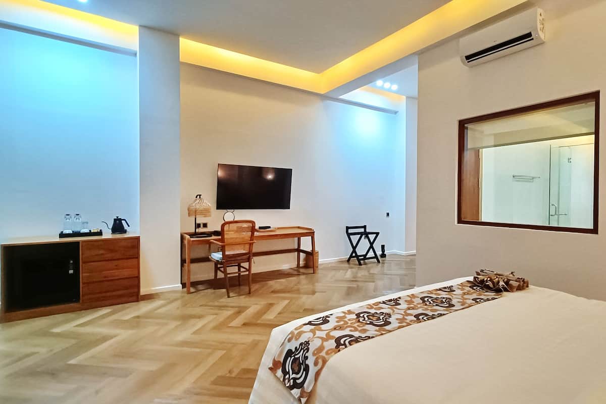 Suite Junior, pemandangan samudra | Seprai premium, brankas, meja kerja, dan ruang kerja ramah laptop